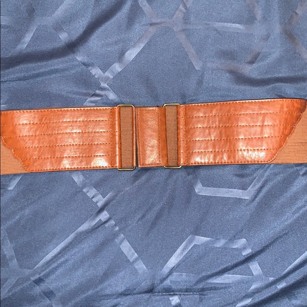 Brown stretchy belt. Size M/L